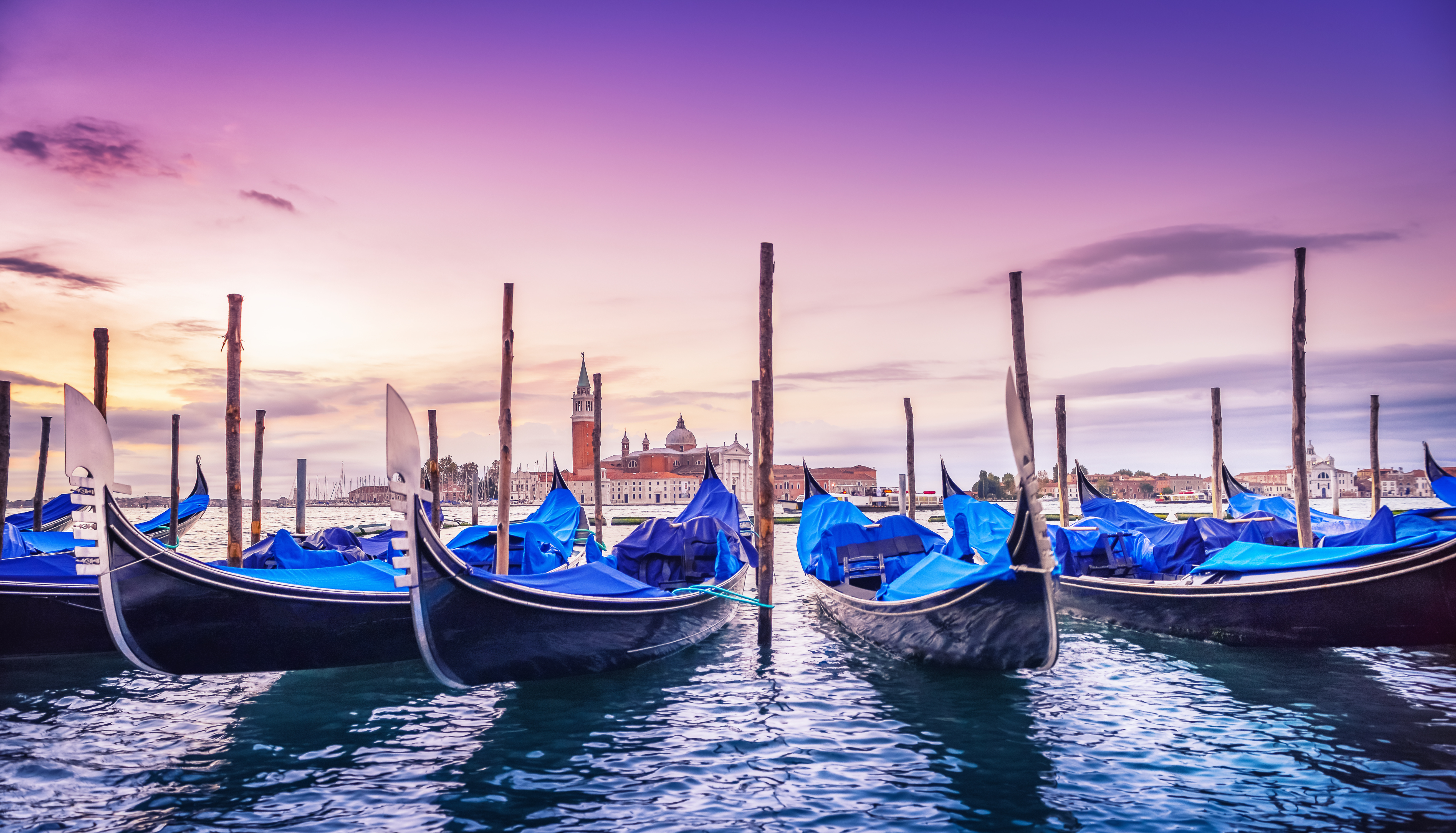 Gondolas docked on the canal